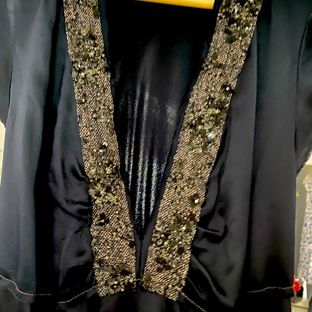 Black evening dress with embroidered neck line. 100% silk. brand new. Gorgeous!